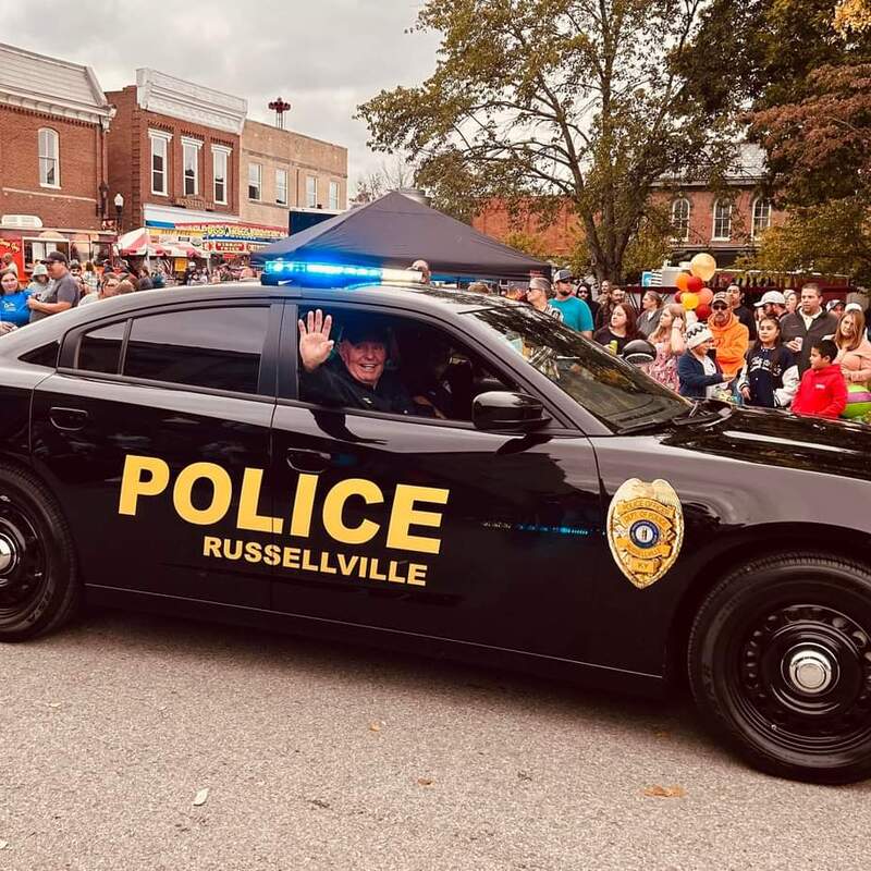 Chaplain Mike Humble riding with RPD in Tobacco Festival Parade