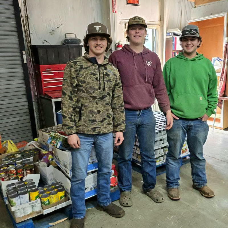 FFA Members with canned goods they collected
